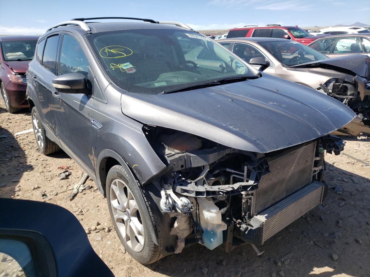 FORD ESCAPE TIT 2014 with VIN 1FMCU0J9XEUE47641 - Photo from auction