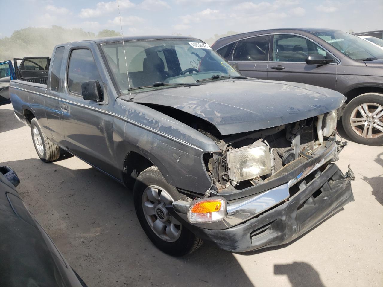 NISSAN FRONTIER K 2000 with VIN 1N6DD26S9YC414850 - Photo from auction