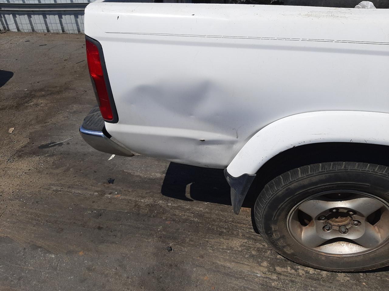 Photo 9 from auction – 2000 NISSAN FRONTIER C with VIN 1N6ED27TXYC357828