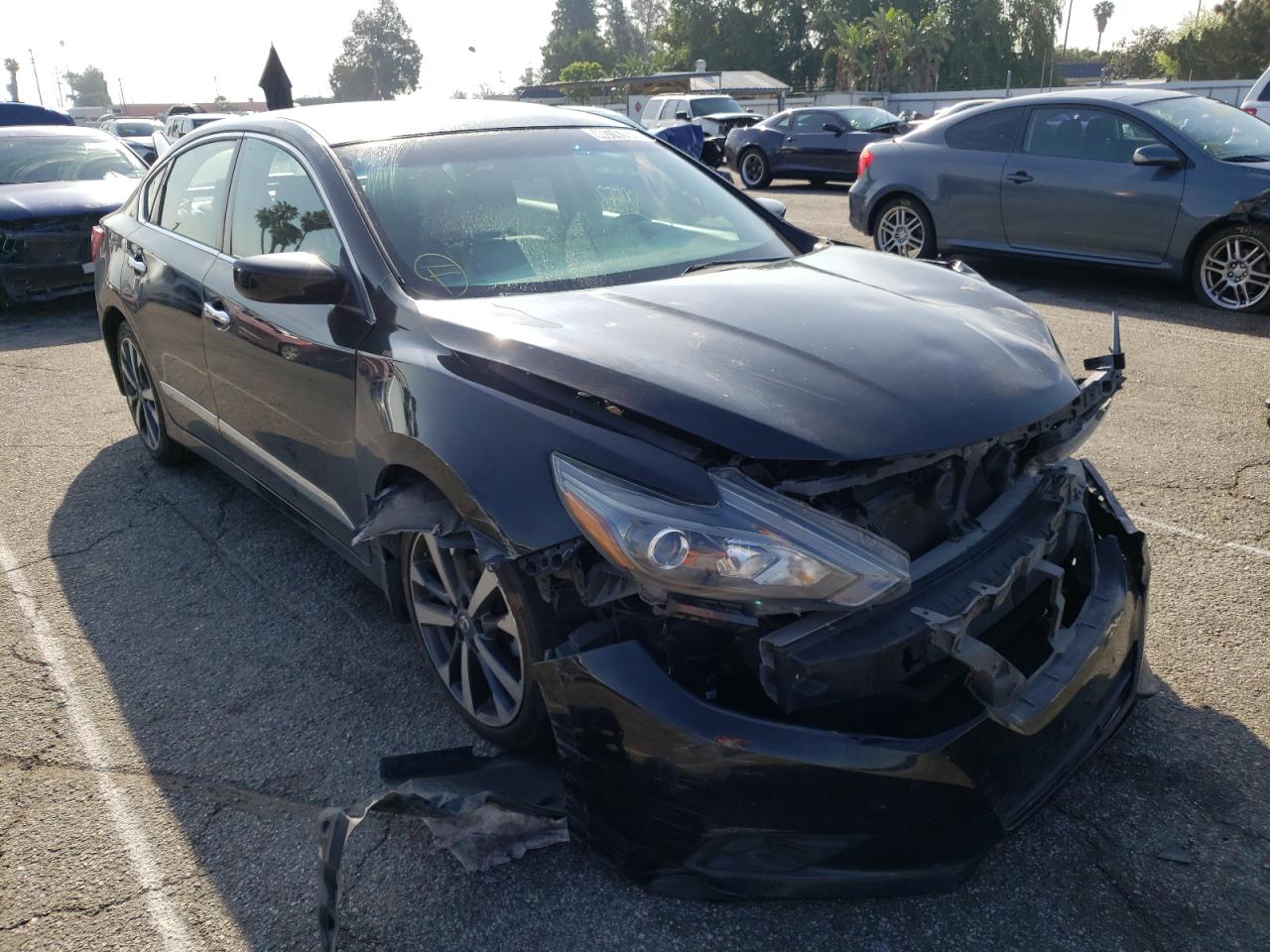 NISSAN ALTIMA 2.5 2016 with VIN 1N4AL3AP0GN329938 - Photo from auction