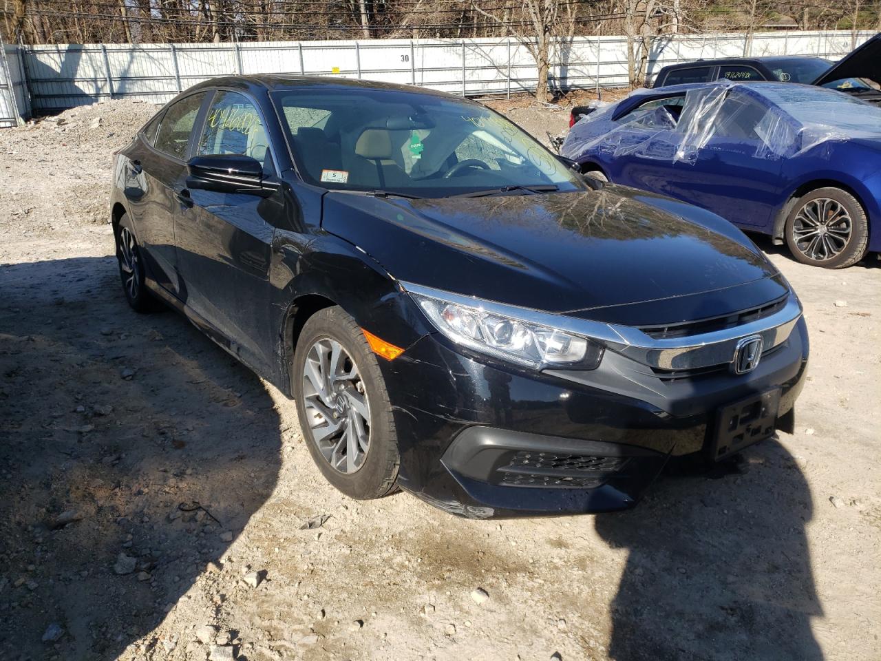 HONDA CIVIC EX 2018 with VIN 19XFC2F76JE203596 - Photo from auction