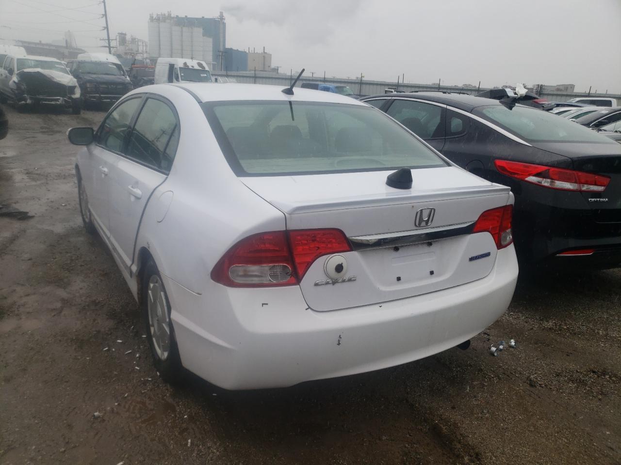 Photo 3 from auction – 2011 HONDA CIVIC HYBR with VIN JHMFA3F25BS000048