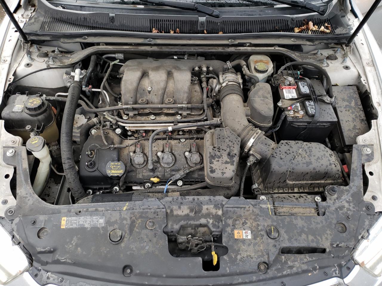 Photo 7 from auction – 2014 FORD TAURUS SEL with VIN 1FAHP2E88EG131190