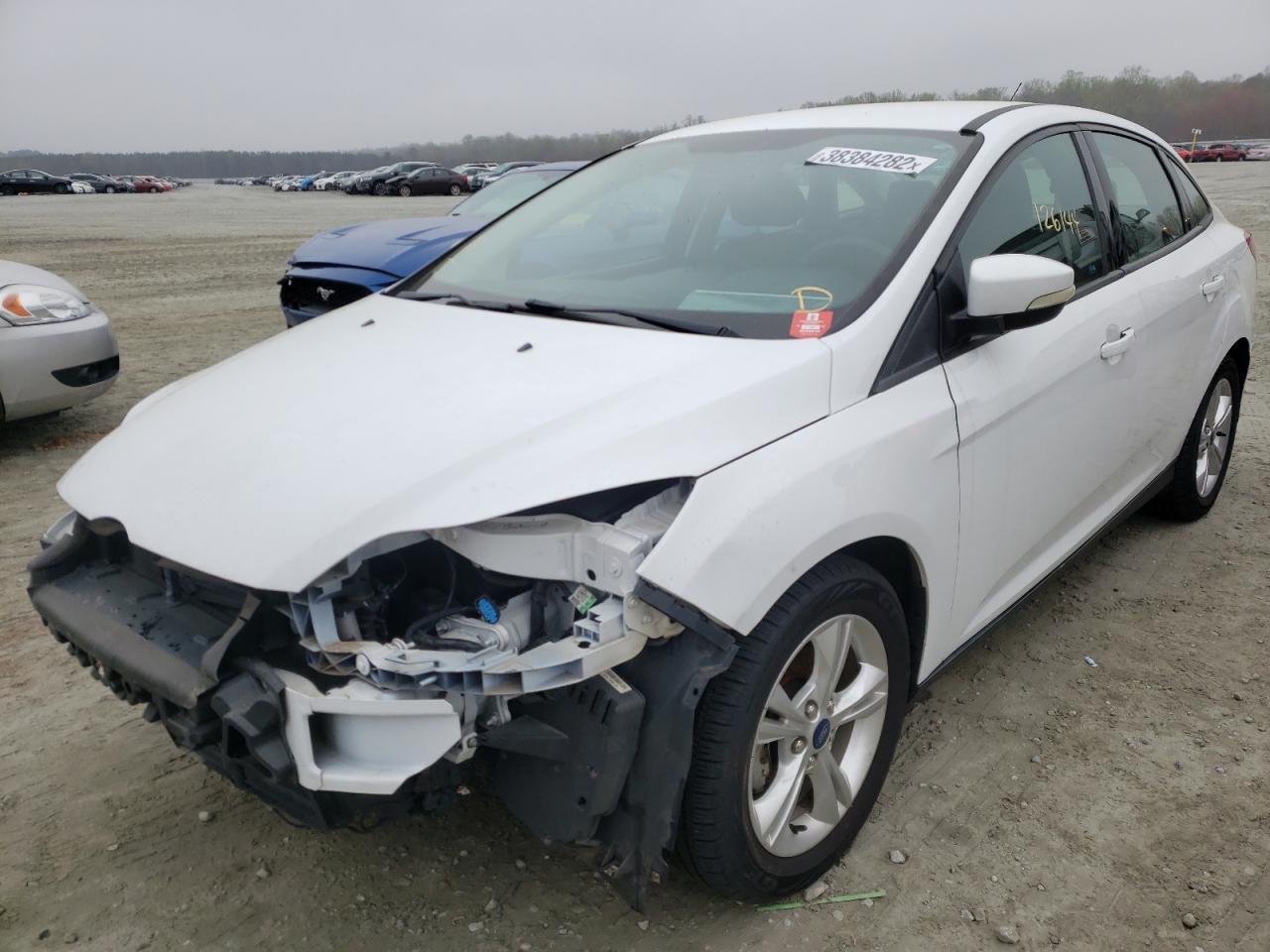 Photo 2 from auction – 2014 FORD FOCUS SE with VIN 1FADP3F29EL155102