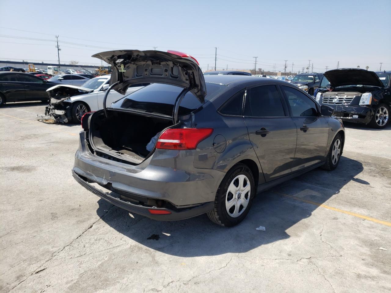 Photo 4 from auction – 2017 FORD FOCUS S with VIN 1FADP3E24HL325162