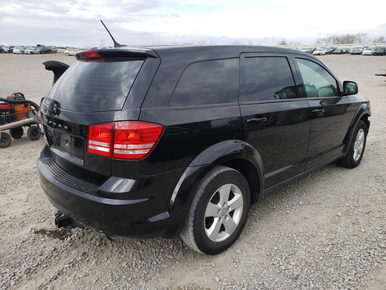 Photo 4 from auction – 2013 DODGE JOURNEY SE with VIN 3C4PDCAB7DT577699