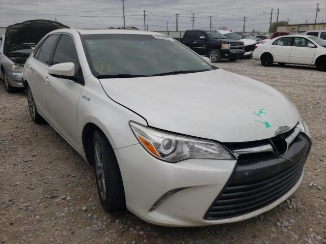 TOYOTA CAMRY HYBR 2015 with VIN 4T1BD1FK3FU163024 - Photo from auction