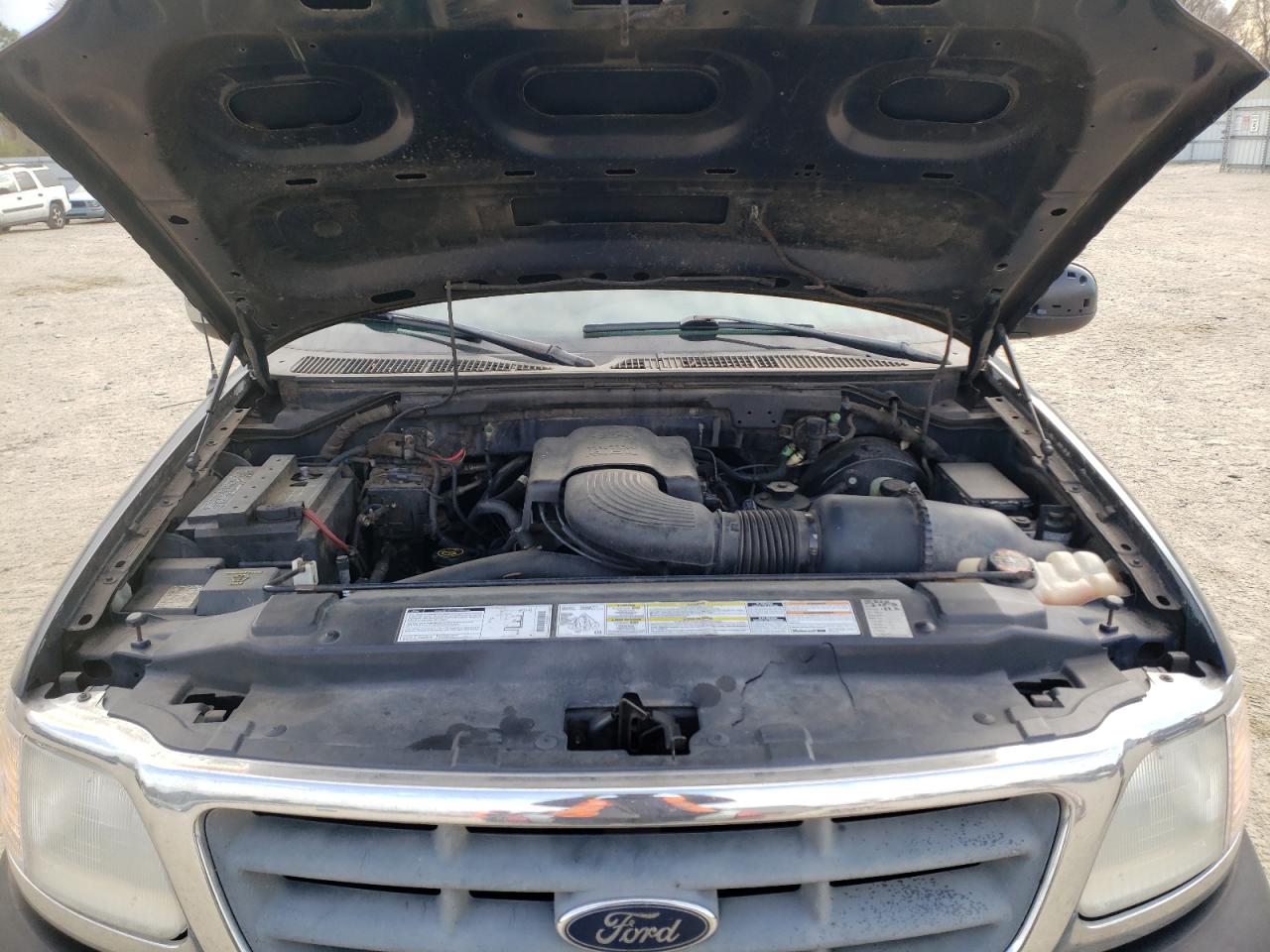Photo 7 from auction – 2000 FORD F150 with VIN 1FTRX17W3YNA95932