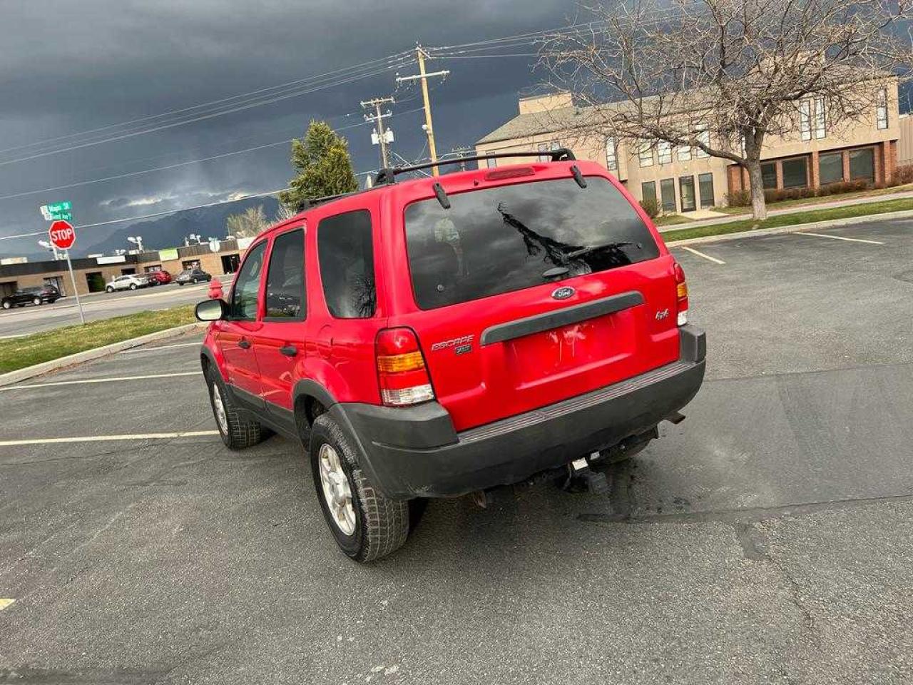 Photo 3 from auction – 2002 FORD ESCAPE XLT with VIN 1FMYU04112KA90207