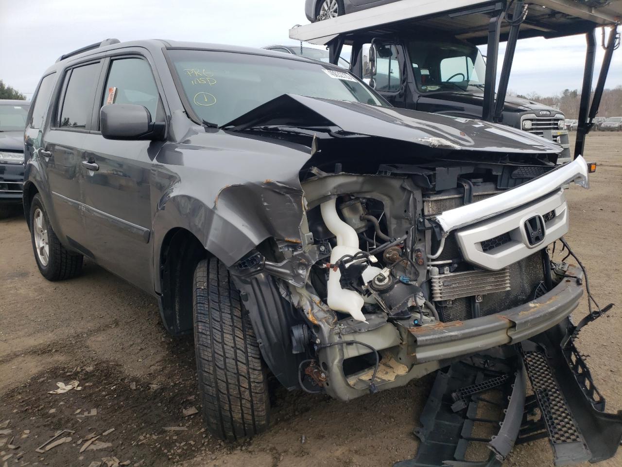 HONDA PILOT EXL 2011 with VIN 5FNYF4H59BB044009 - Photo from auction