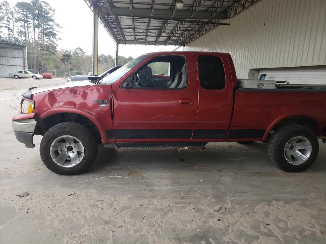 Photo 9 from auction – 2000 FORD F150 with VIN 1FTRX18W6YNA21144