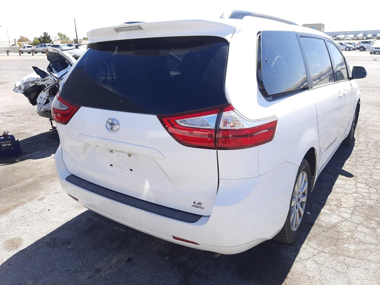 Photo 4 from auction – 2015 TOYOTA SIENNA LE with VIN 5TDJK3DC9FS108952
