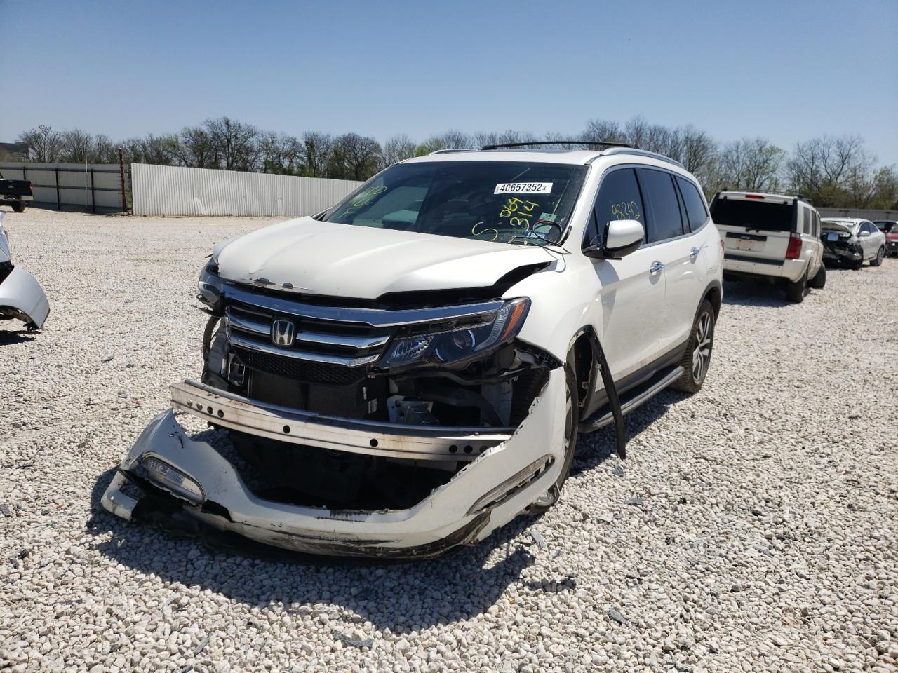 Photo 2 from auction – 2016 HONDA PILOT ELIT with VIN 5FNYF6H05GB064314