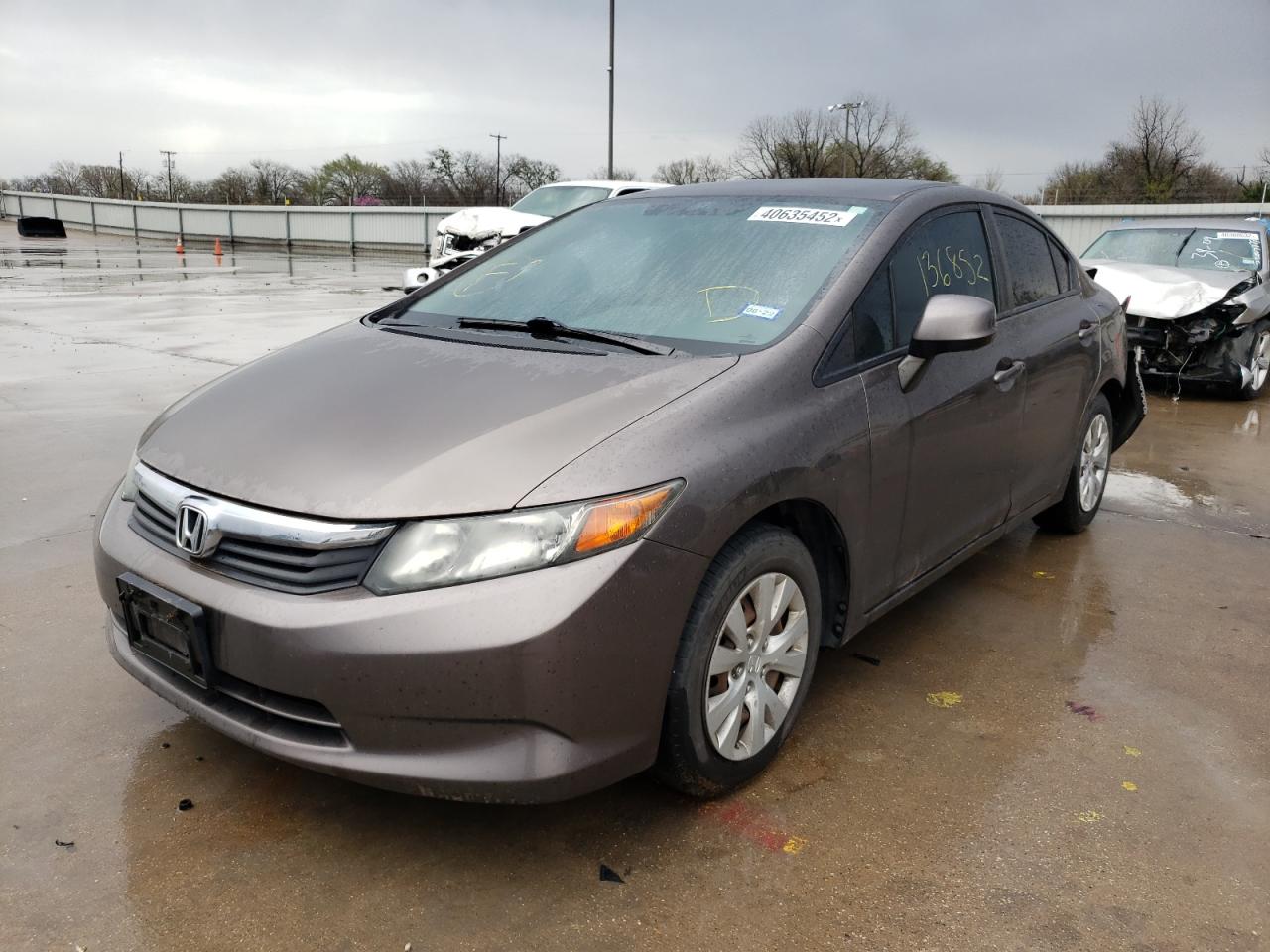 Photo 2 from auction – 2012 HONDA CIVIC LX with VIN 2HGFB2F50CH609075