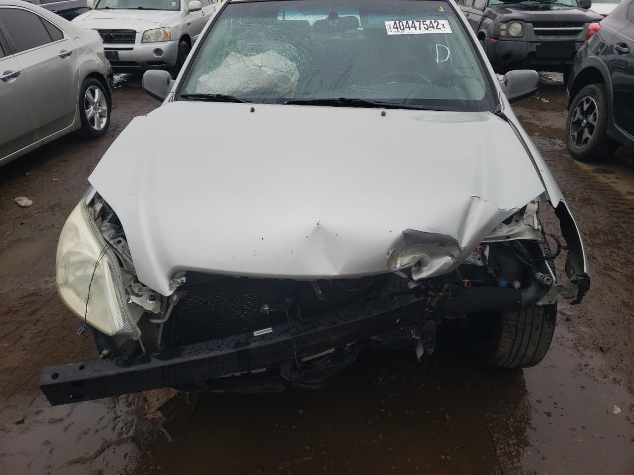 Photo 9 from auction – 2003 TOYOTA COROLLA MA with VIN 2T1LR32E13C122485