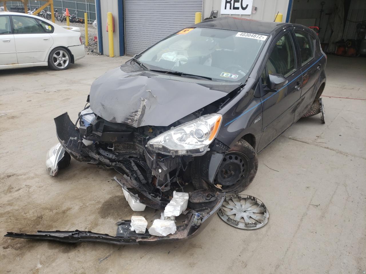 Photo 2 from auction – 2014 TOYOTA PRIUS C with VIN JTDKDTB37E1566048