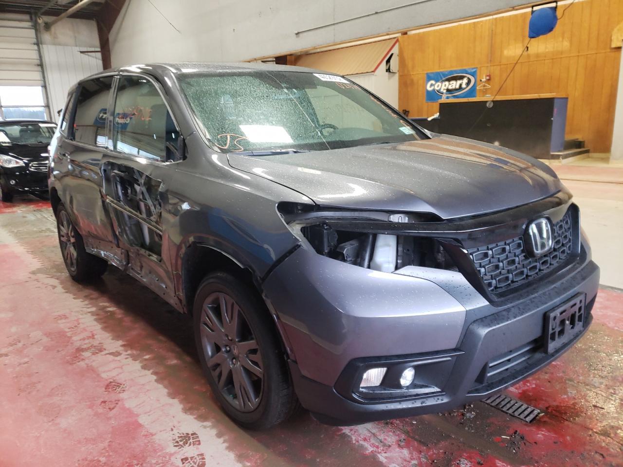 HONDA PASSPORT E 2019 with VIN 5FNYF8H56KB025733 - Photo from auction