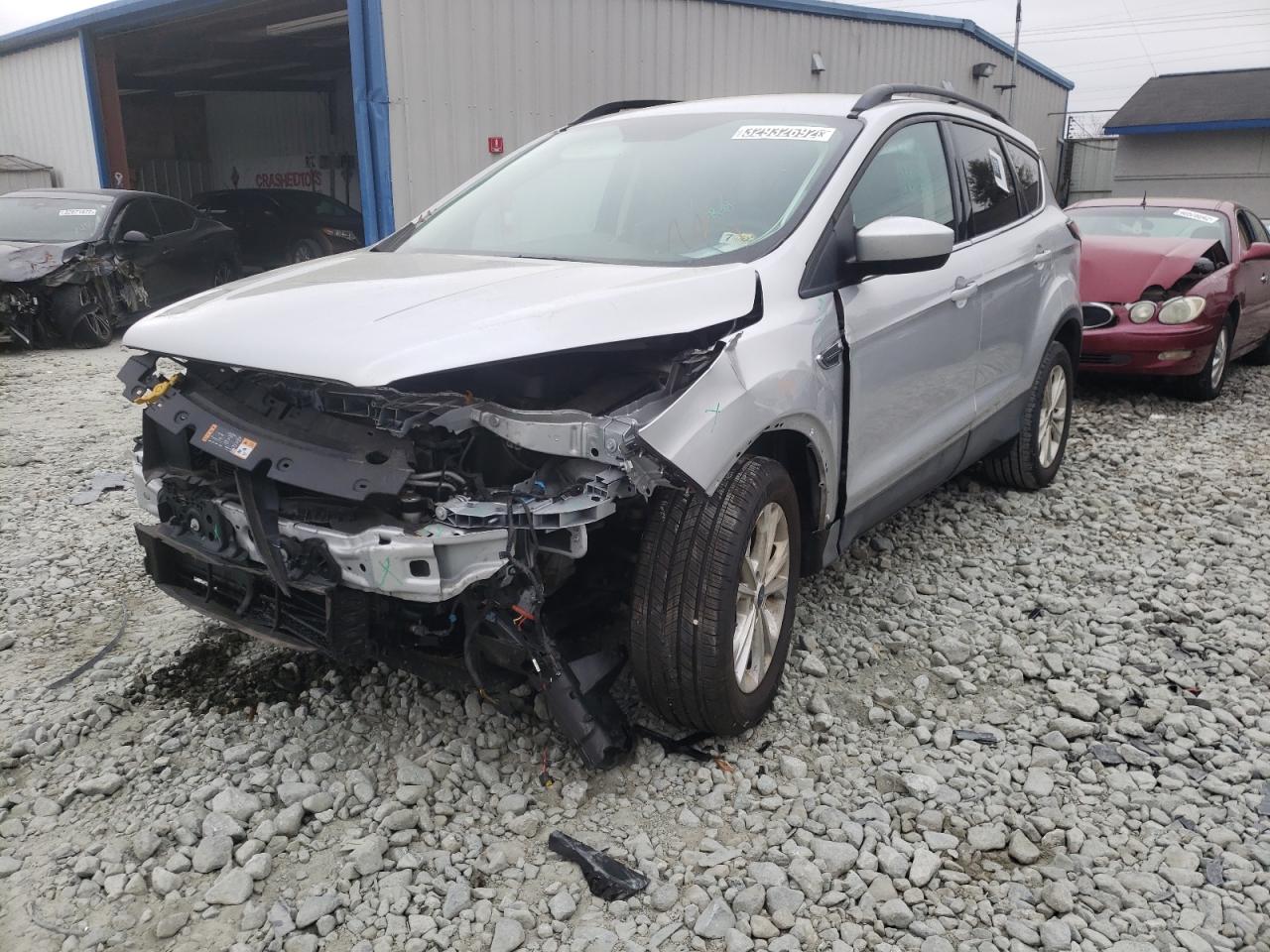 Photo 2 from auction – 2018 FORD ESCAPE SE with VIN 1FMCU0GD0JUD06020