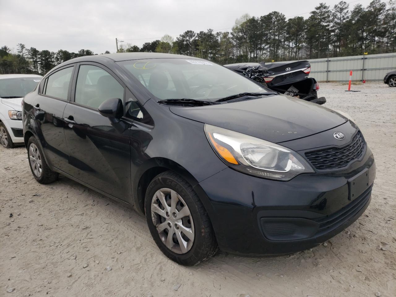 KIA RIO LX 2013 with VIN KNADM4A37D6266881 - Photo from auction