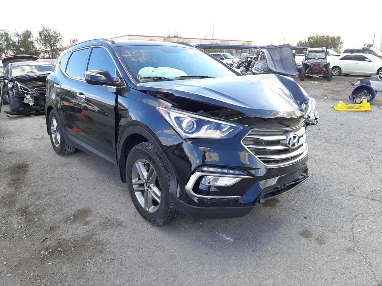 HYUNDAI SANTA FE S 2017 with VIN 5NMZU3LB3HH026145 - Photo from auction