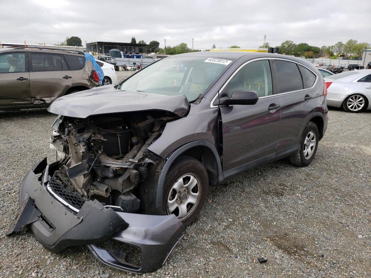Photo 2 from auction – 2015 HONDA CR-V LX with VIN 5J6RM4H31FL112731