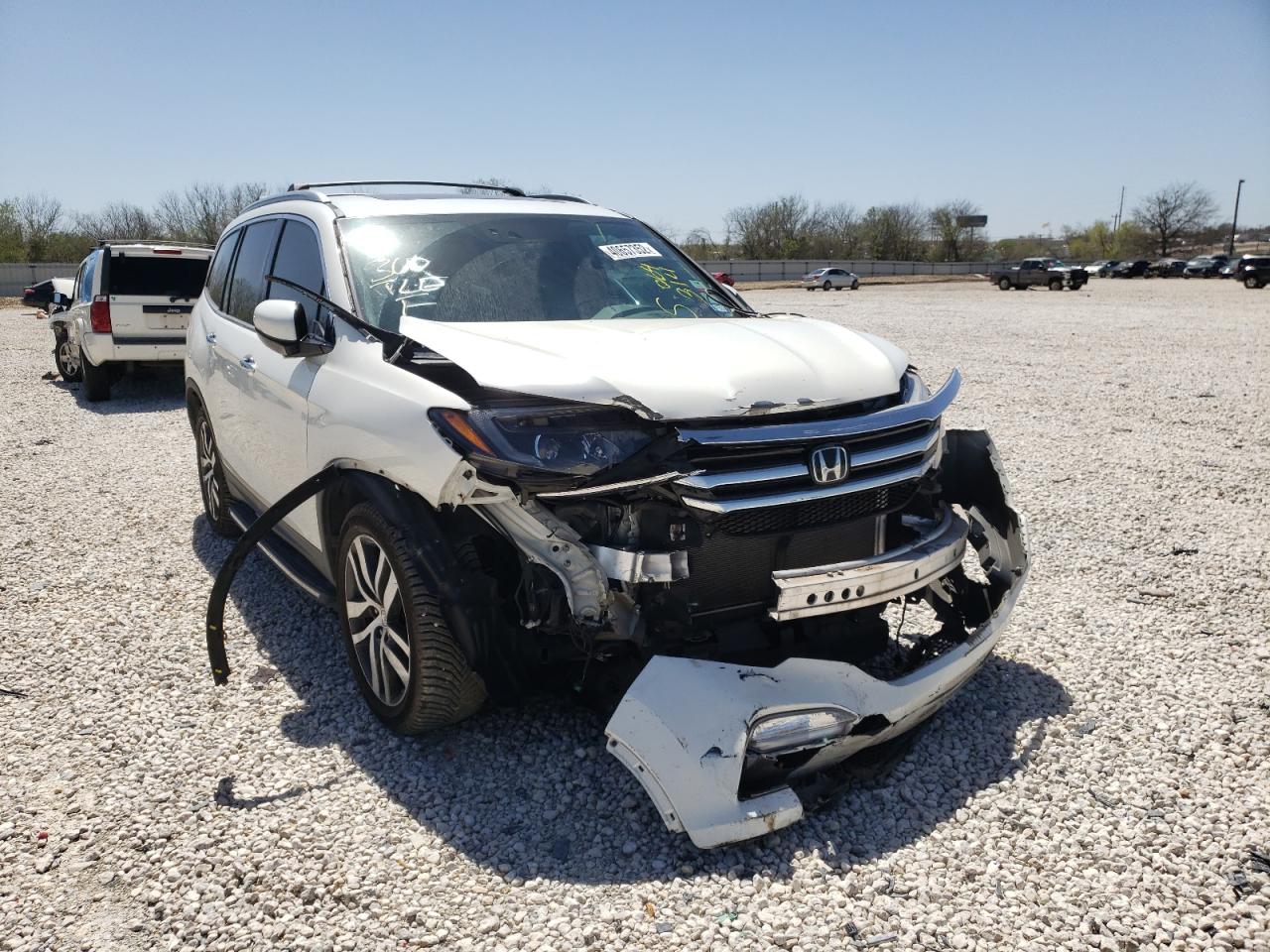 HONDA PILOT ELIT 2016 with VIN 5FNYF6H05GB064314 - Photo from auction