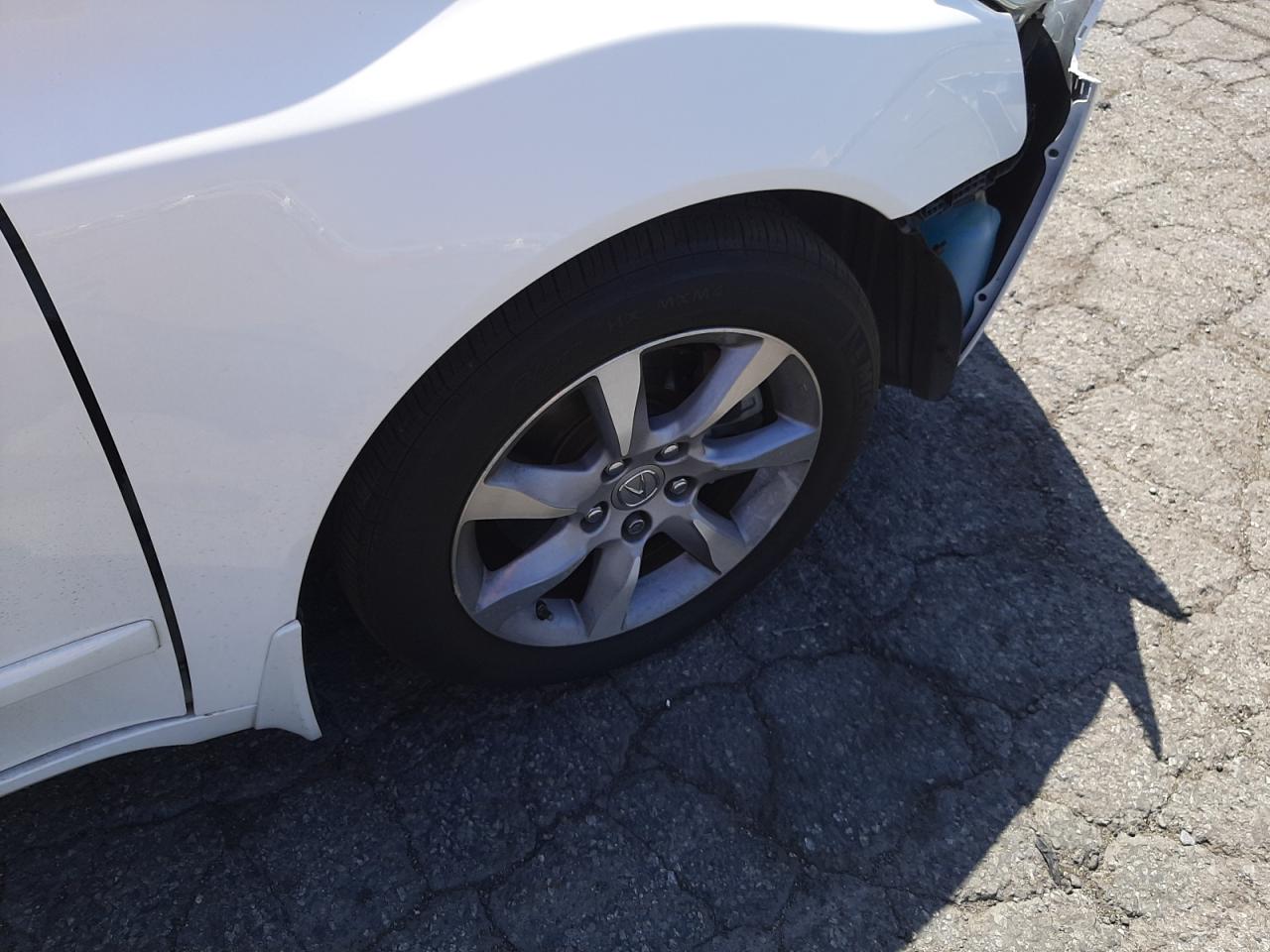 Photo 9 from auction – 2012 ACURA TL with VIN 19UUA8F55CA019885
