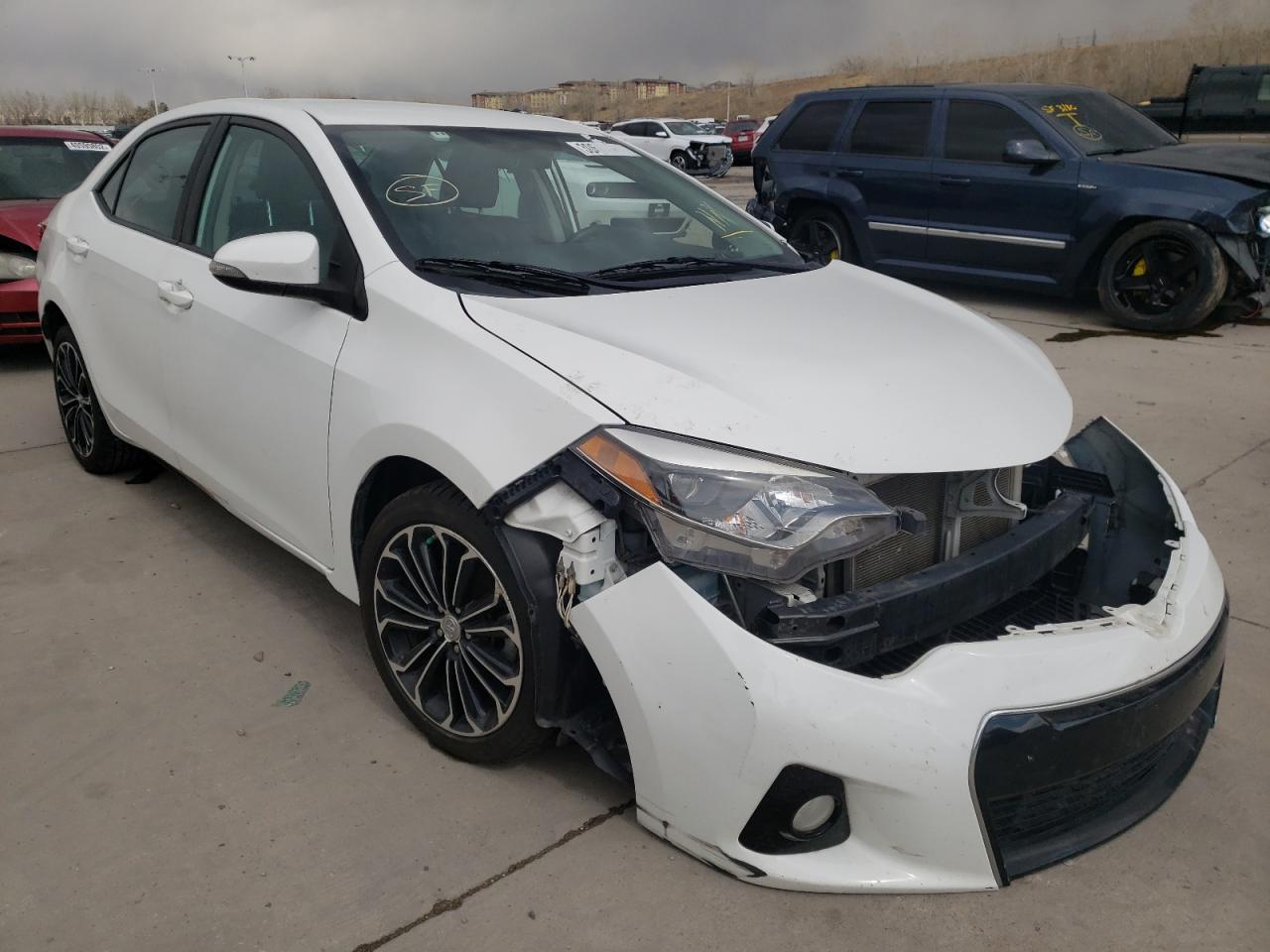 TOYOTA COROLLA L 2015 with VIN 5YFBURHE5FP318325 - Photo from auction