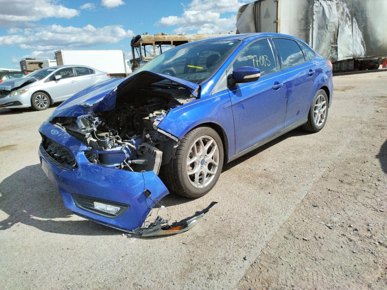 Photo 2 from auction – 2015 FORD FOCUS SE with VIN 1FADP3F26FL323649