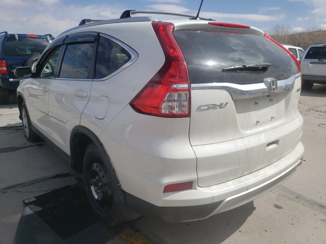 Photo 3 from auction – 2016 HONDA CR-V EXL with VIN 5J6RM4H73GL003143