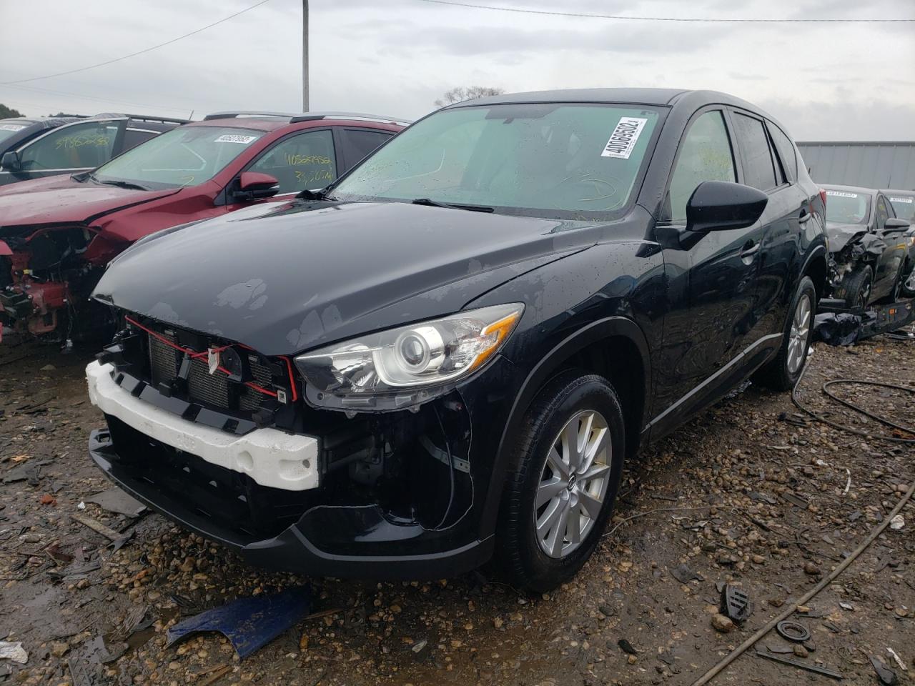 Photo 2 from auction – 2015 MAZDA CX-5 TOURI with VIN JM3KE4CYXF0446708