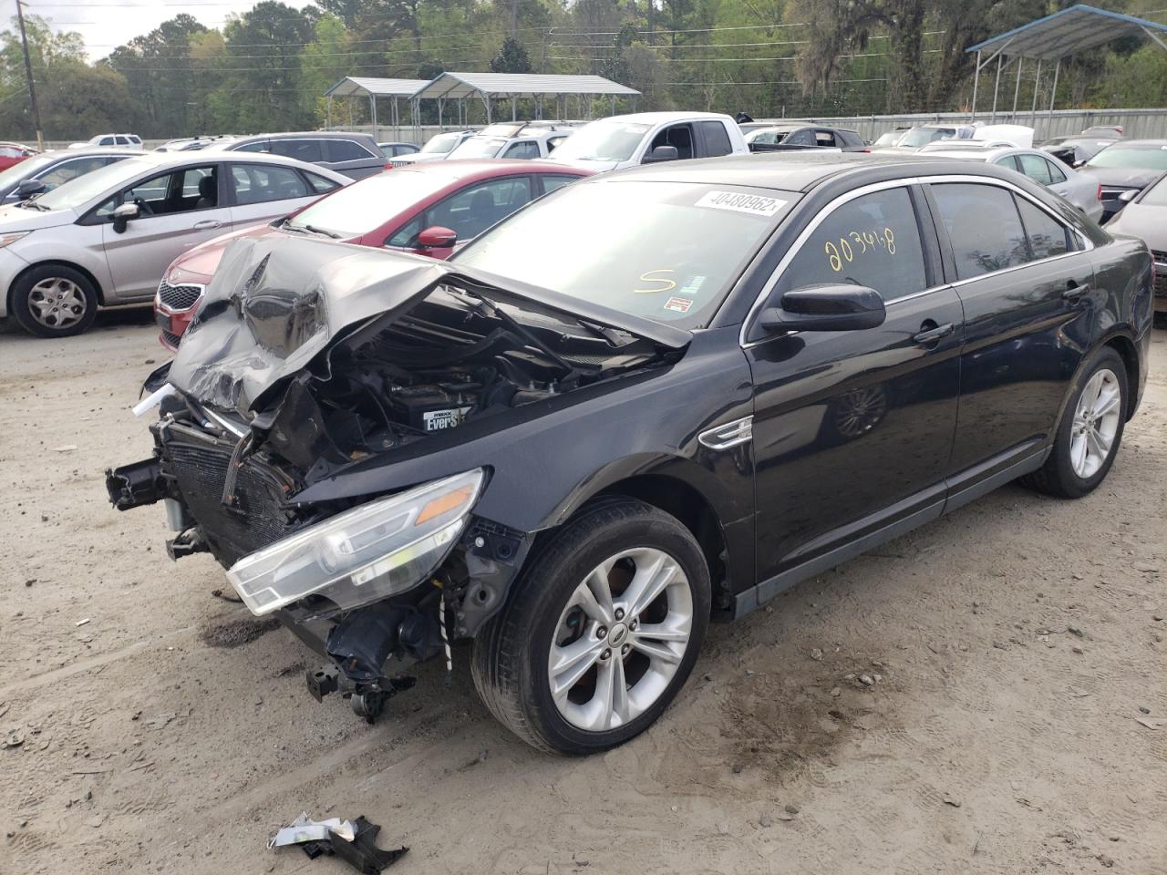 Photo 2 from auction – 2013 FORD TAURUS SEL with VIN 1FAHP2E83DG235939