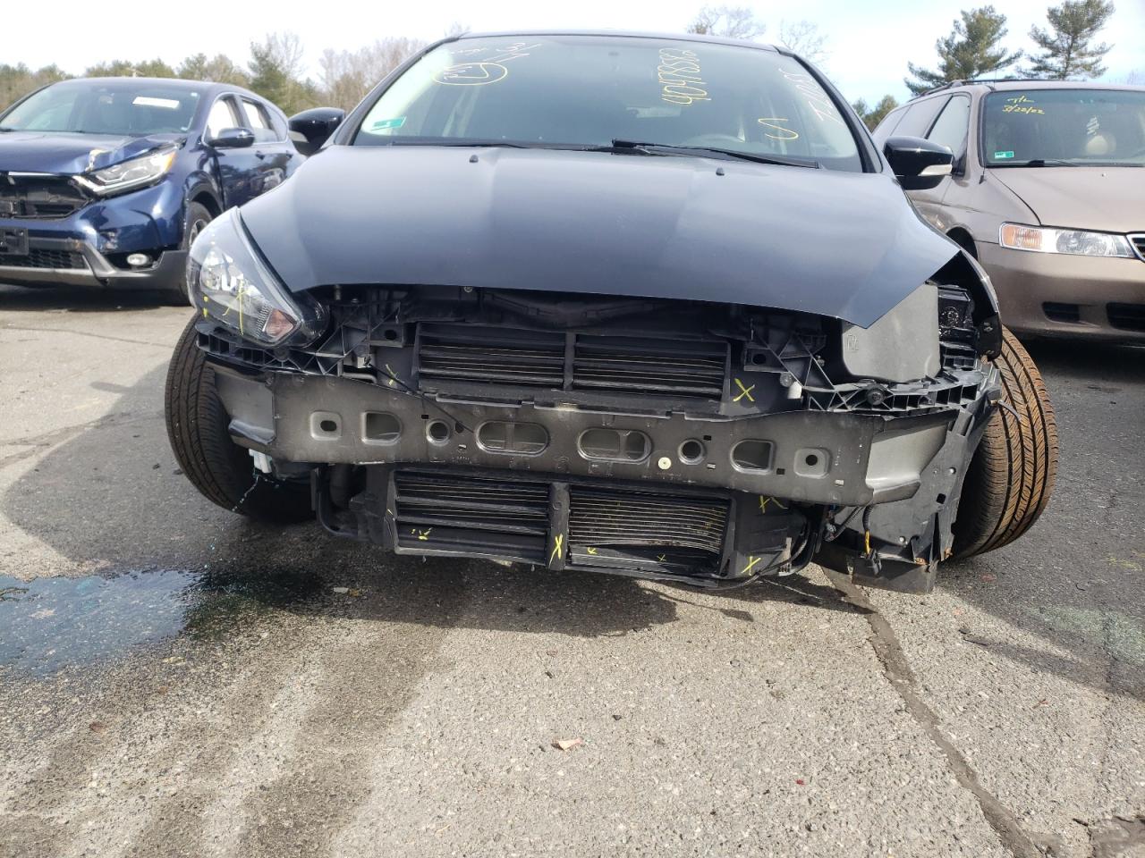 Photo 9 from auction – 2018 FORD FOCUS SEL with VIN 1FADP3M22JL213287