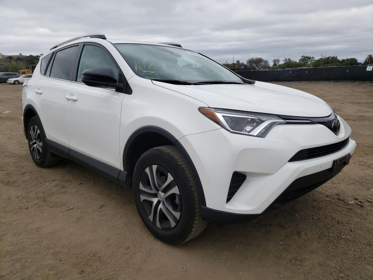 TOYOTA RAV4 LE 2018 with VIN 2T3ZFREV9JW460074 - Photo from auction