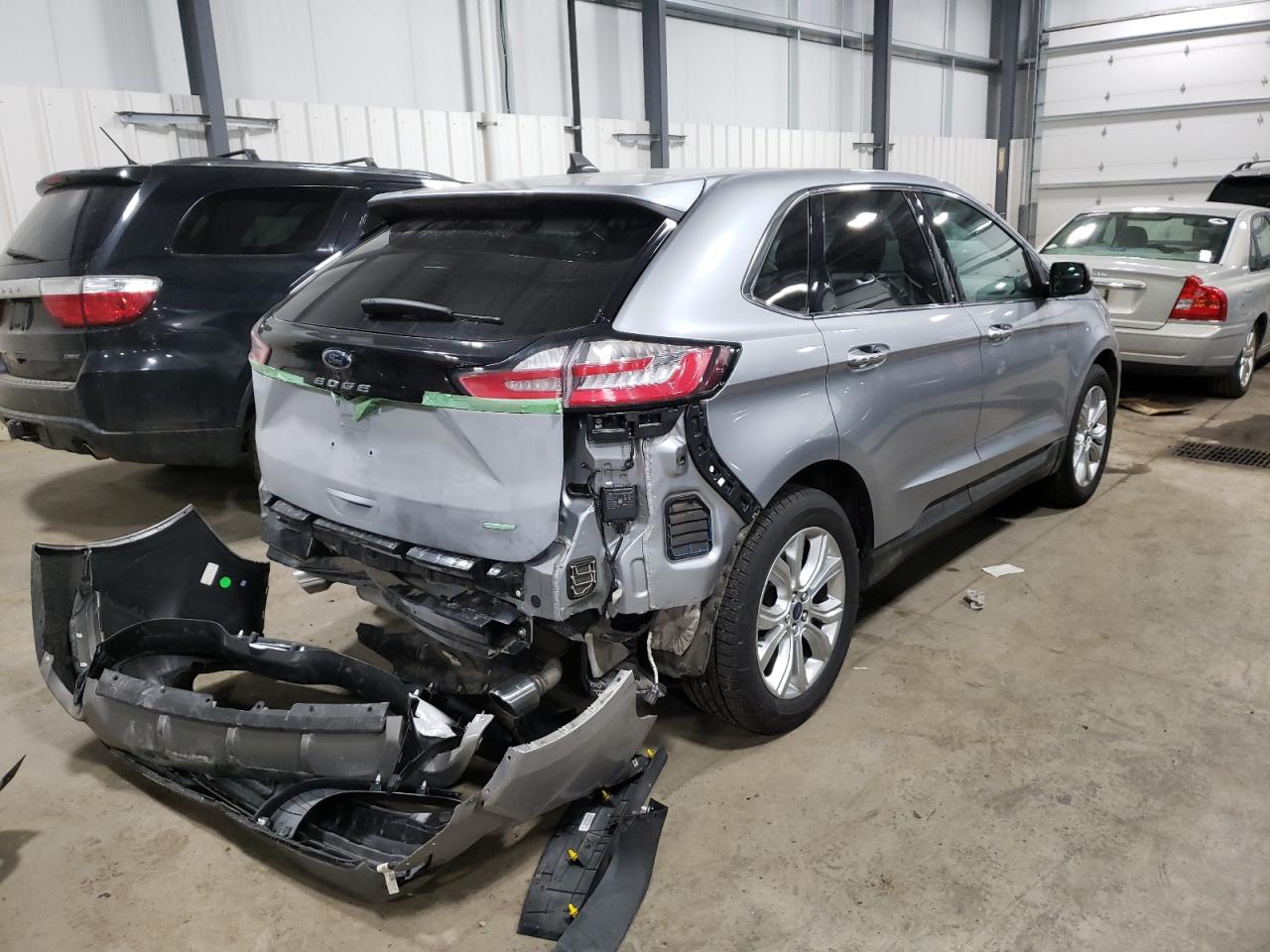 Photo 4 from auction – 2021 FORD EDGE TITAN with VIN 2FMPK4K97MBA13422