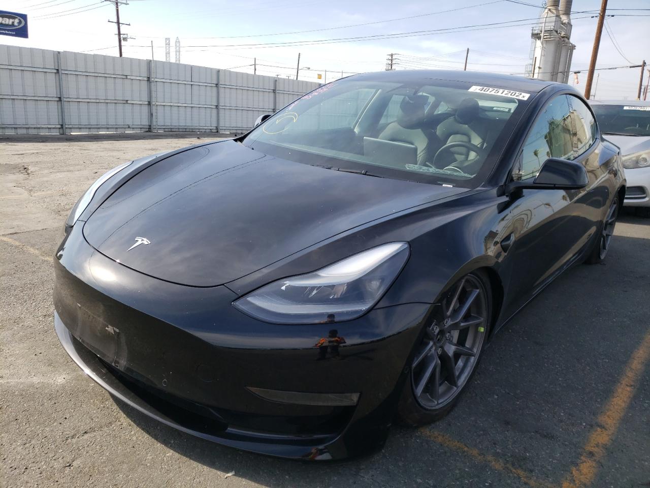 Photo 2 from auction – 2021 TESLA MODEL 3 with VIN 5YJ3E1EA1MF091700