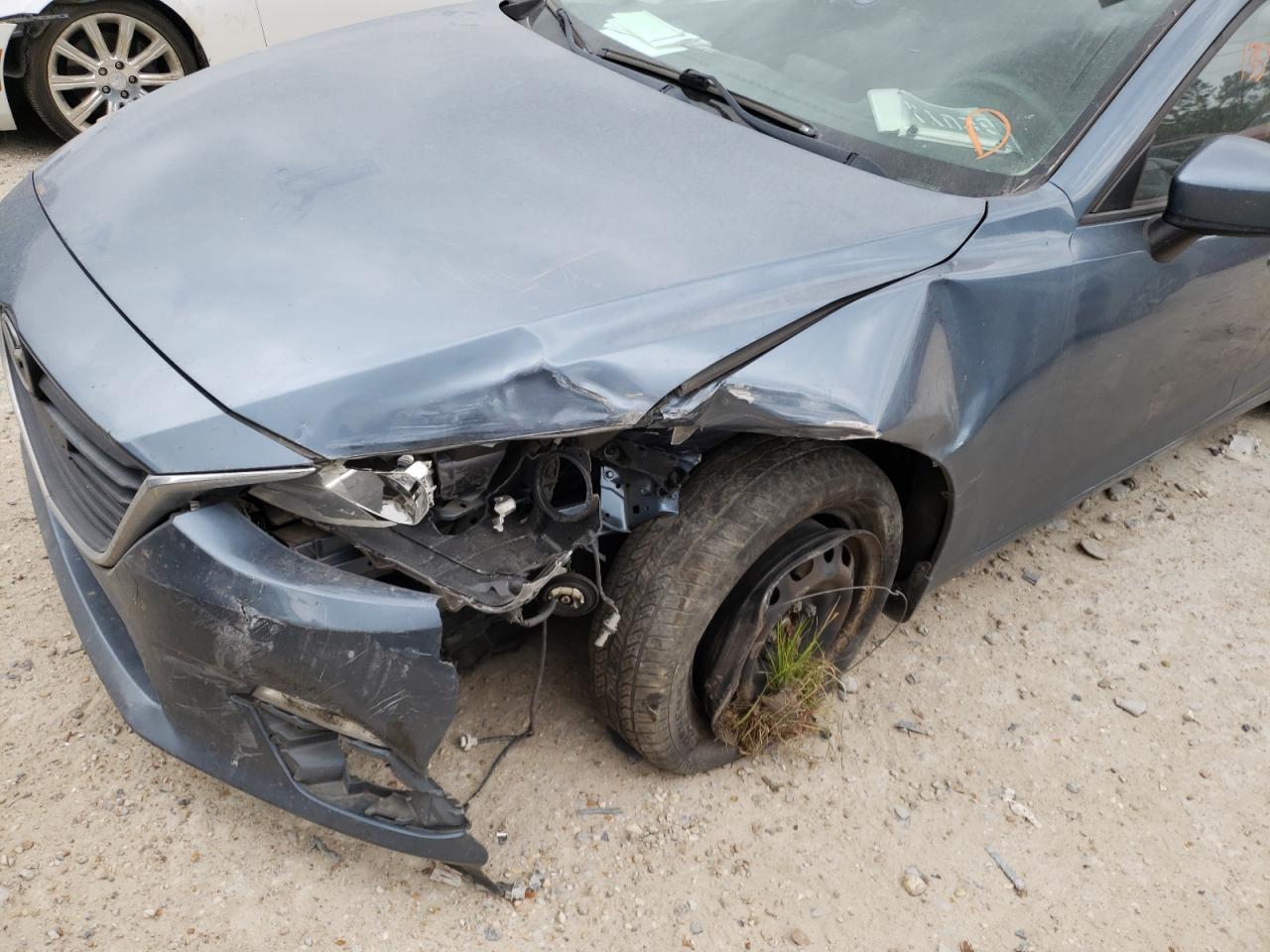 Photo 9 from auction – 2014 MAZDA 3 SPORT with VIN JM1BM1U73E1146405