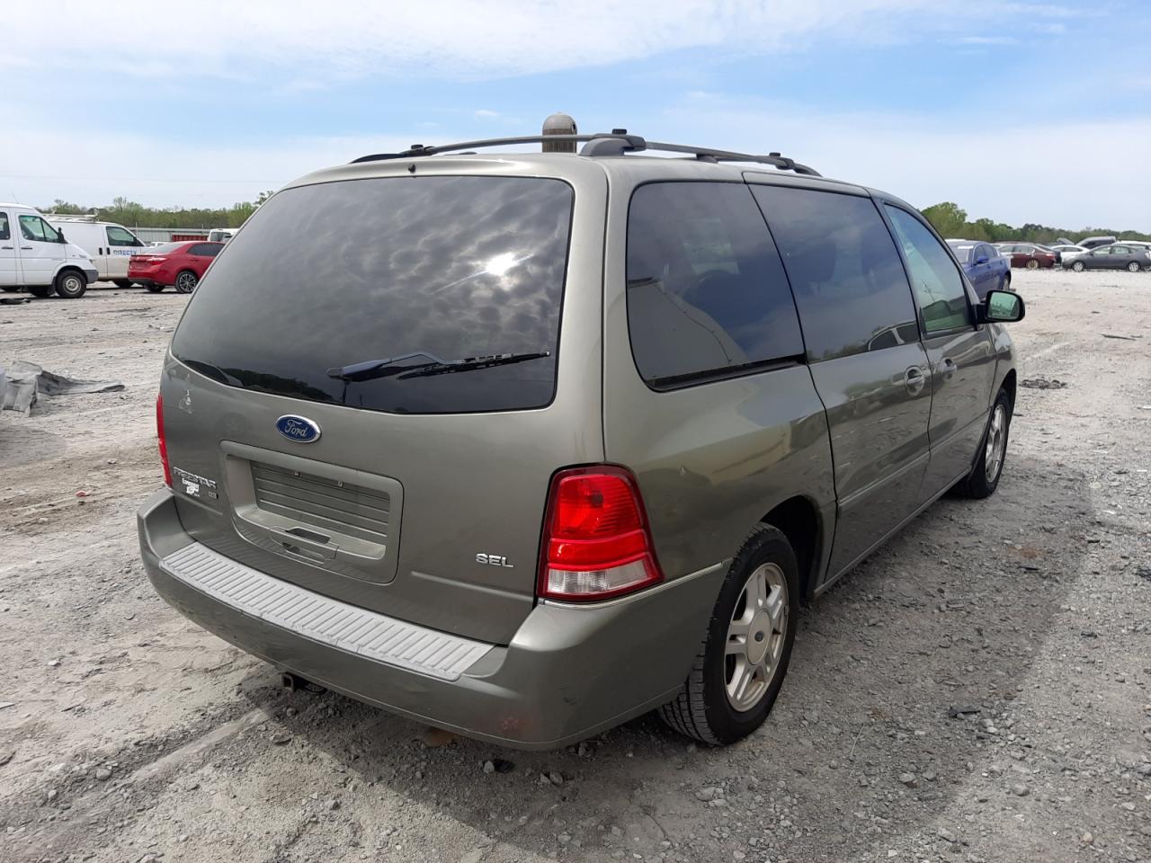 Photo 4 from auction – 2004 FORD FREESTAR S with VIN 2FMZA52254BB02183