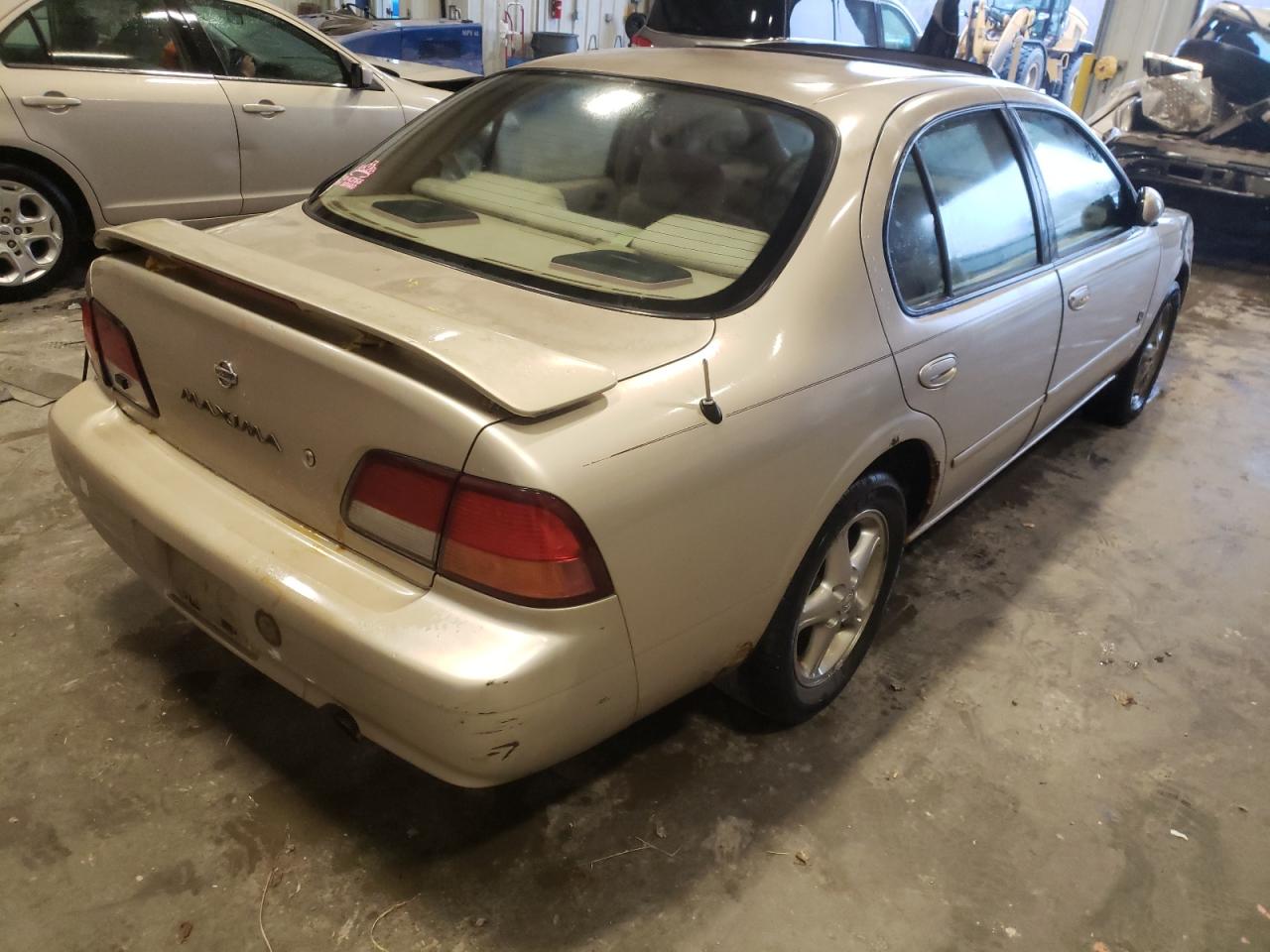 Photo 4 from auction – 1999 NISSAN MAXIMA GLE with VIN JN1CA21D7XT221632