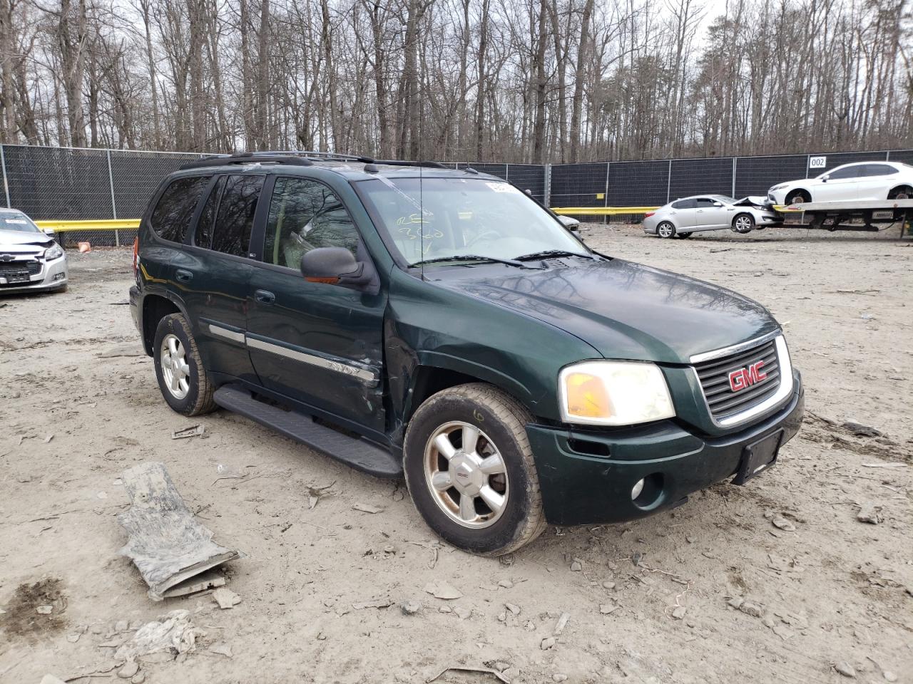 GMC ENVOY 2004 with VIN 1GKDT13S442417955 - Photo from auction
