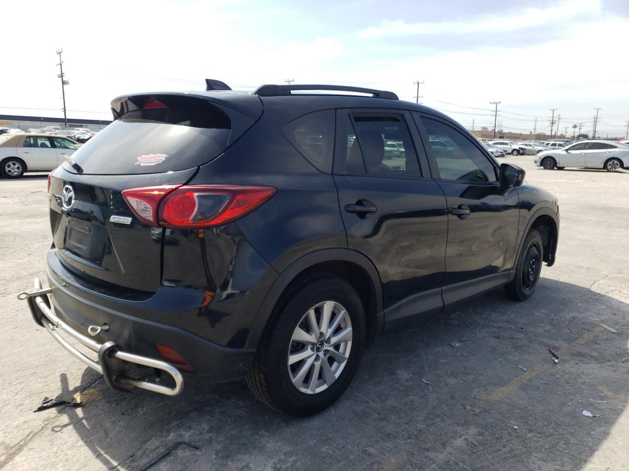Photo 4 from auction – 2015 MAZDA CX-5 TOURI with VIN JM3KE2CY1F0436668