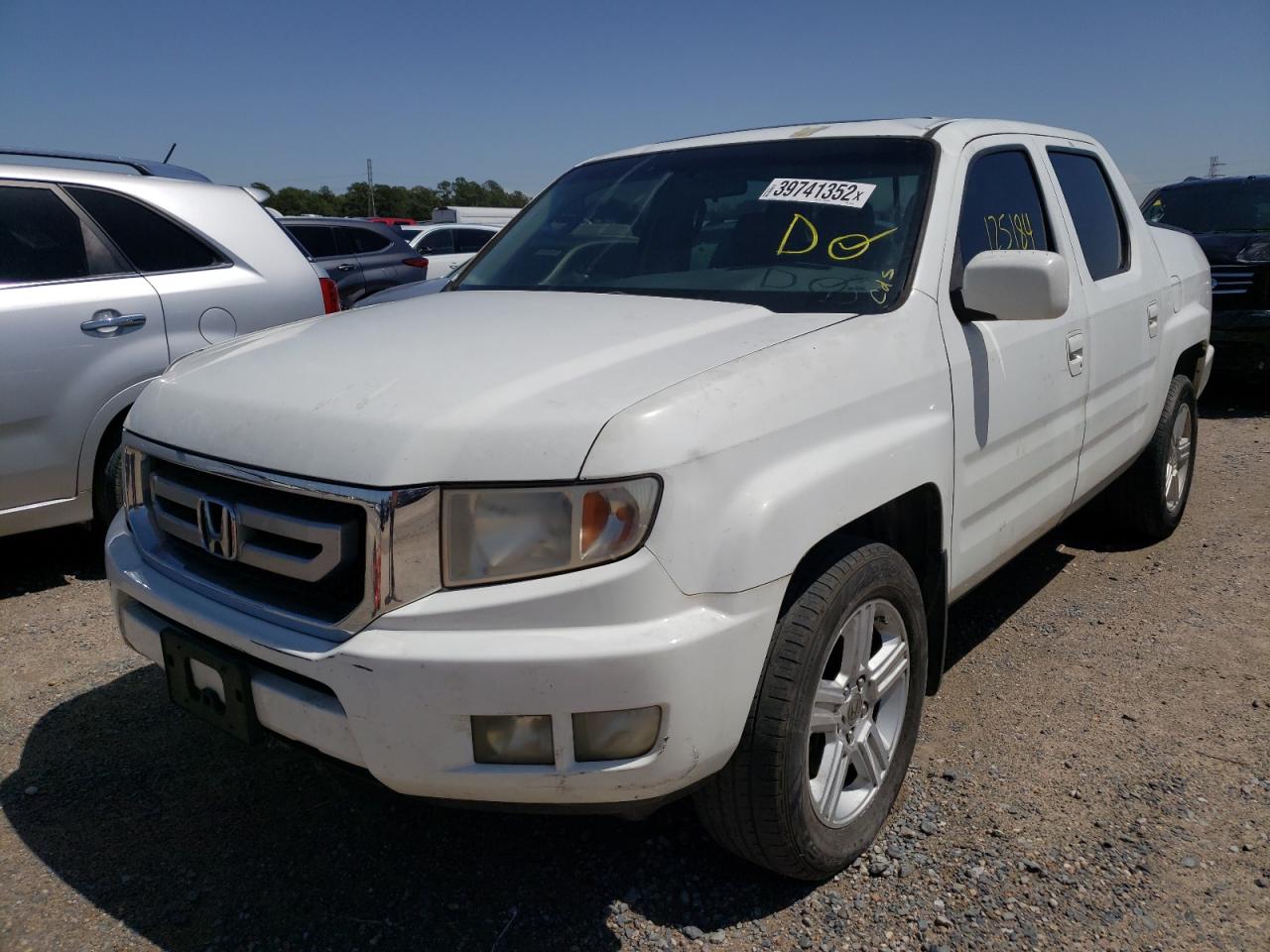 Photo 2 from auction – 2009 HONDA RIDGELINE with VIN 5FPYK16519B100913