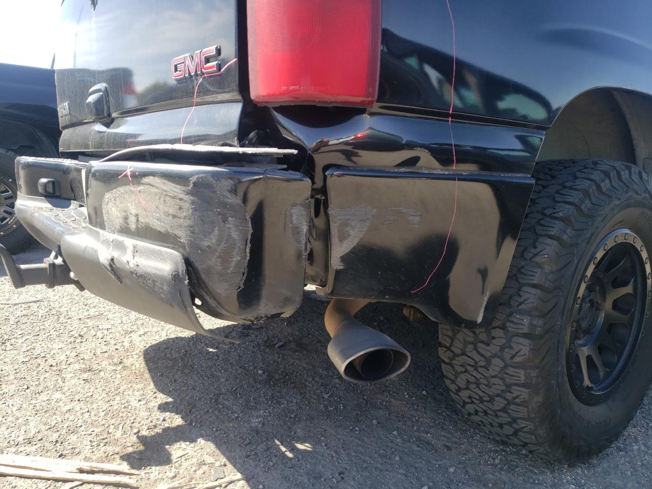 Photo 9 from auction – 2002 GMC DENALI with VIN 1GKEK63U42J222298