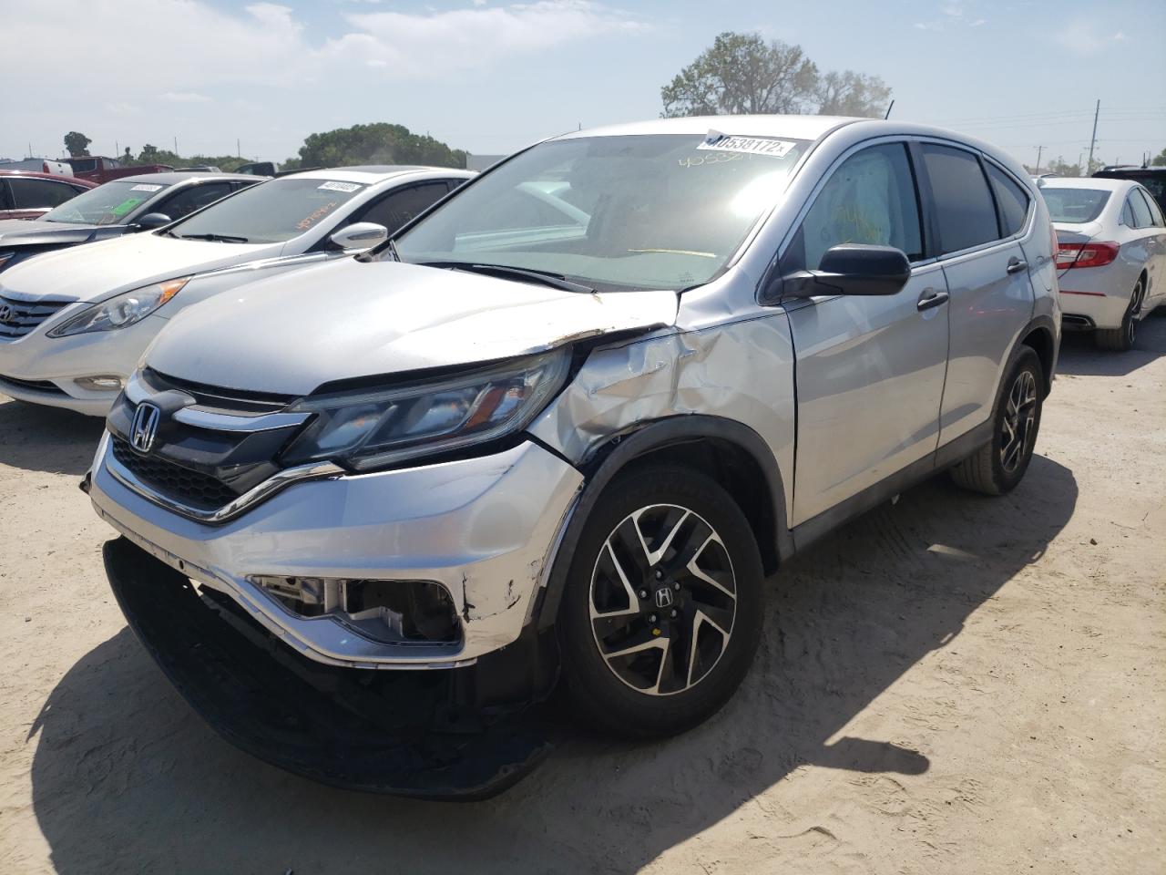 Photo 2 from auction – 2016 HONDA CR-V SE with VIN 2HKRM3H45GH513942