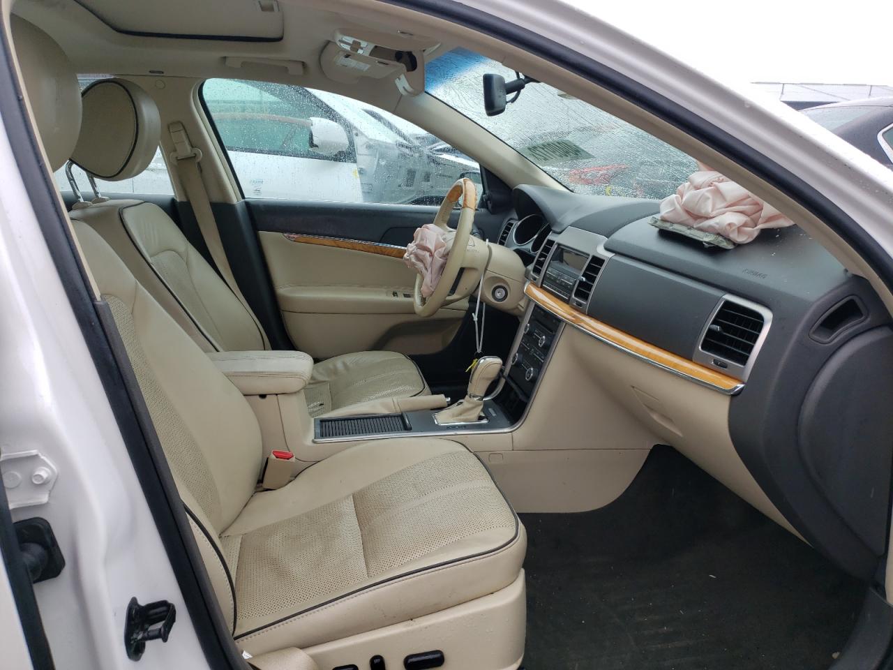 Foto 5 de la subasta – 2011 LINCOLN MKZ con VIN 3LNHL2JC6BR772127