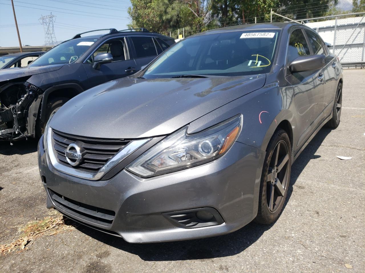 Photo 2 from auction – 2016 NISSAN ALTIMA 2.5 with VIN 1N4AL3AP7GC175675