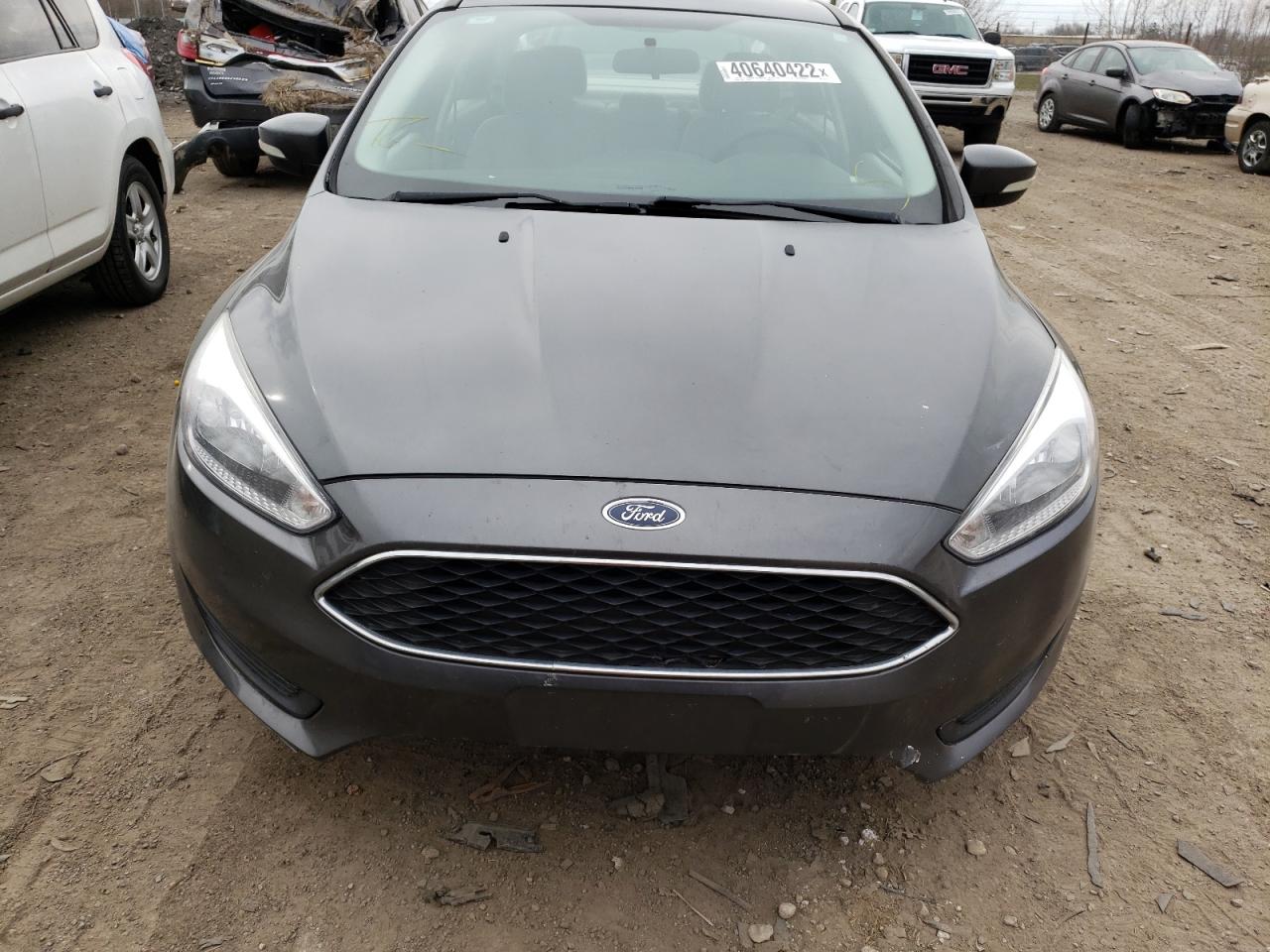 Photo 9 from auction – 2017 FORD FOCUS SE with VIN 1FADP3F20HL264312