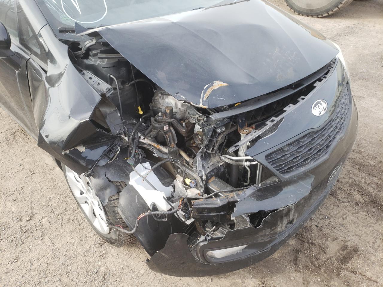 Photo 9 from auction – 2013 KIA RIO LX with VIN KNADM4A35D6159862