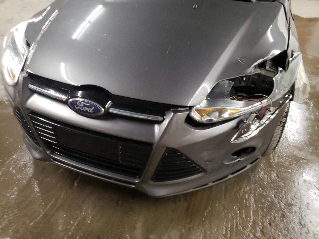 Photo 9 from auction – 2012 FORD FOCUS SE with VIN 1FAHP3K27CL322898