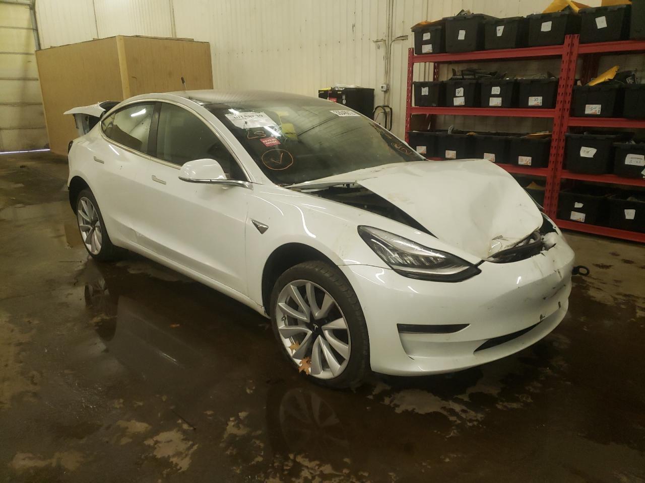 TESLA MODEL 3 2018 with VIN 5YJ3E1EB8JF117794 - Photo from auction